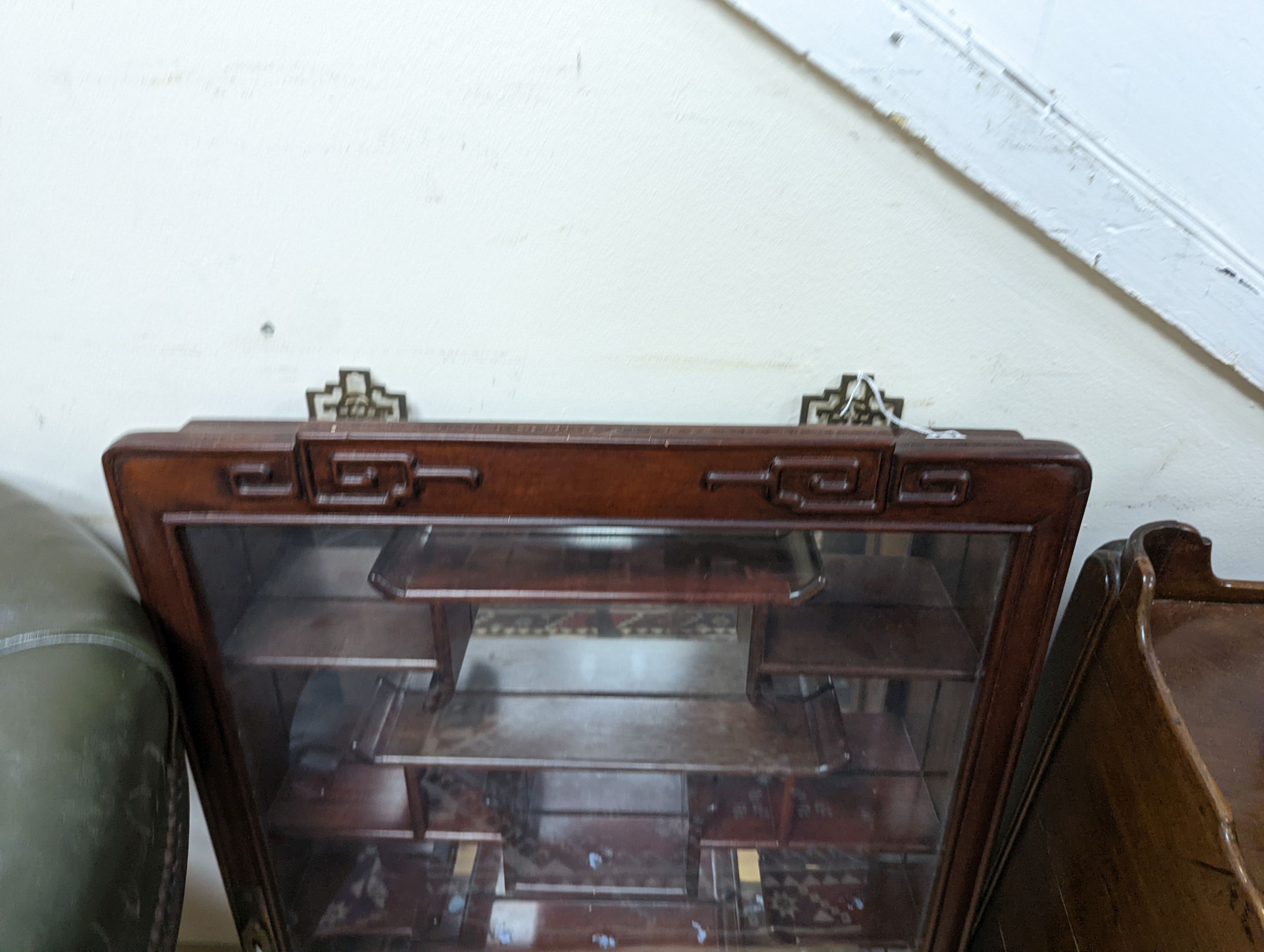 A Chinese glazed hardwood wall display cabinet, width 50cm, height 85cm